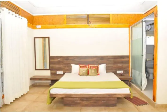 バルコニー付きシングルスタンダードルーム, Megh Malhar Agro Tourism