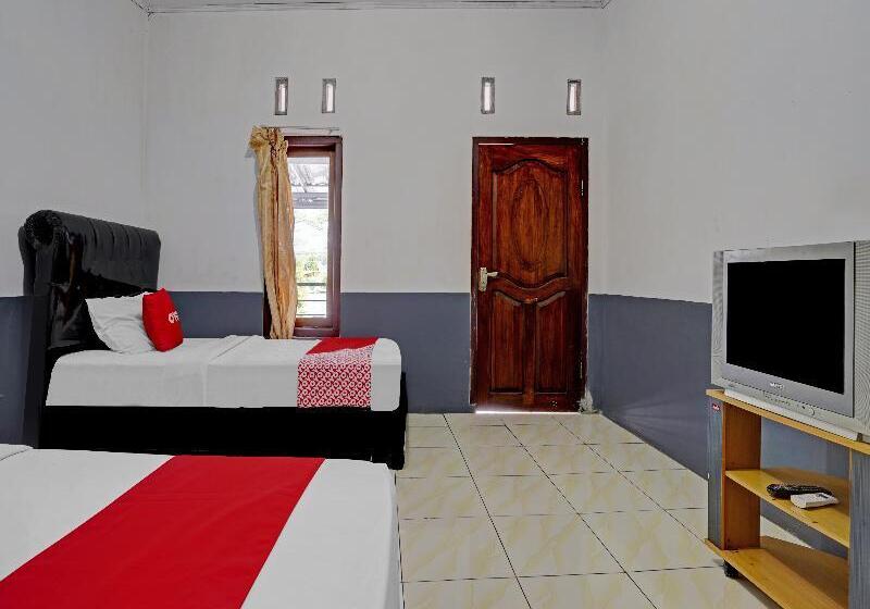 家庭间, Oyo 90405 Penginapan Sasti Kuningan