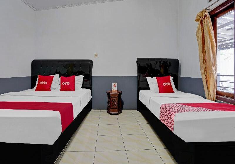 家庭间, Oyo 90405 Penginapan Sasti Kuningan