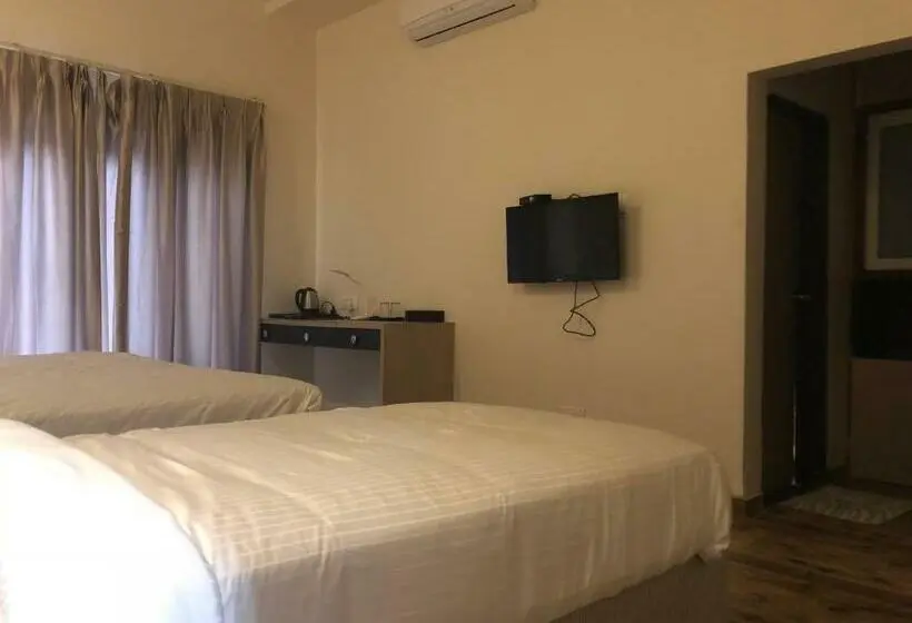 Chambre Triple Economy, Sharanam