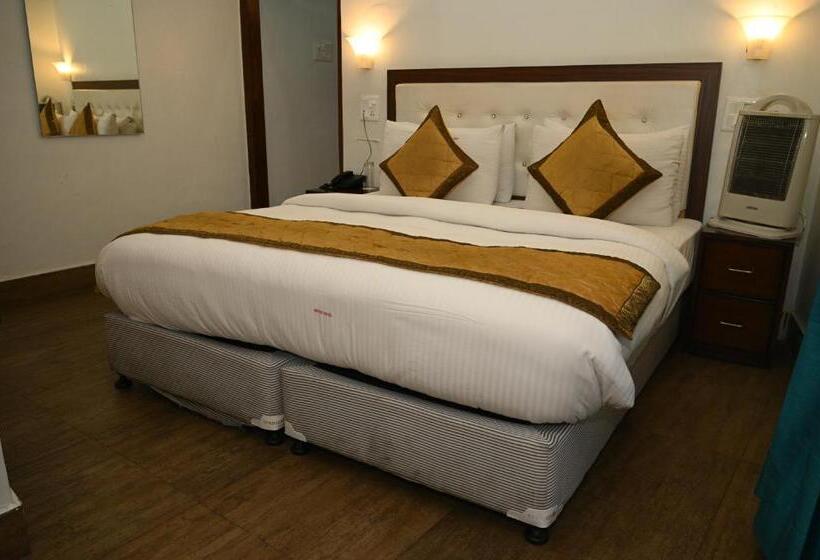 キングサイズベッドのデラックスルーム, Guru Surbhi