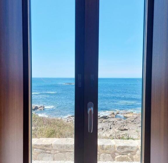 חדר דלוקס, Faro Lariño