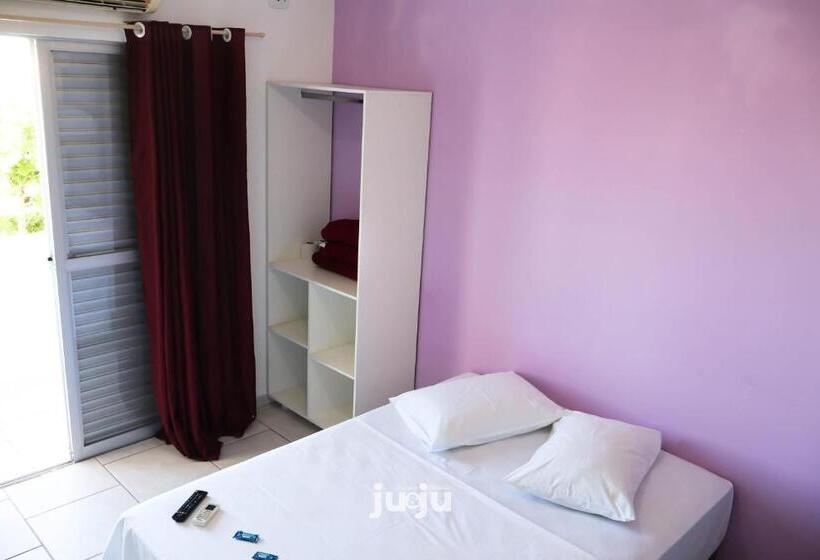 غرفة قياسية رباعية مزودة بشُرفة, Pousada Ju&ju à 400 Mts Da Praia