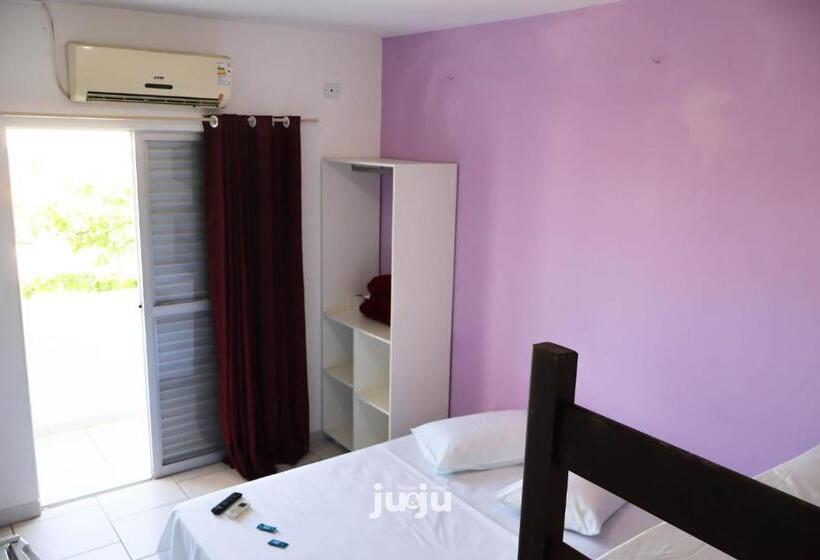غرفة قياسية رباعية مزودة بشُرفة, Pousada Ju&ju à 400 Mts Da Praia