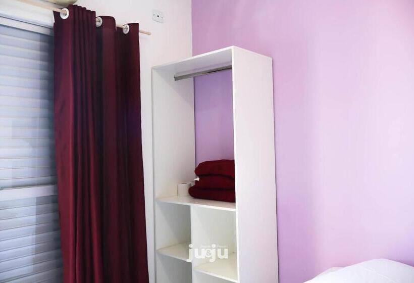 غرفة قياسية رباعية مزودة بشُرفة, Pousada Ju&ju à 400 Mts Da Praia