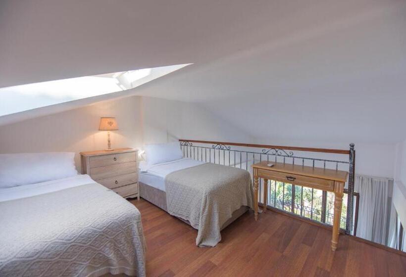 اتاق خانوادگی با چشمانداز باغ, Cocos The Club Solto