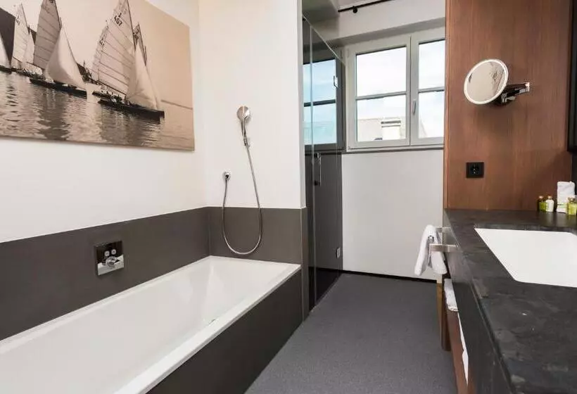 Superior room with lake view, Boutique Hotel Aichinger