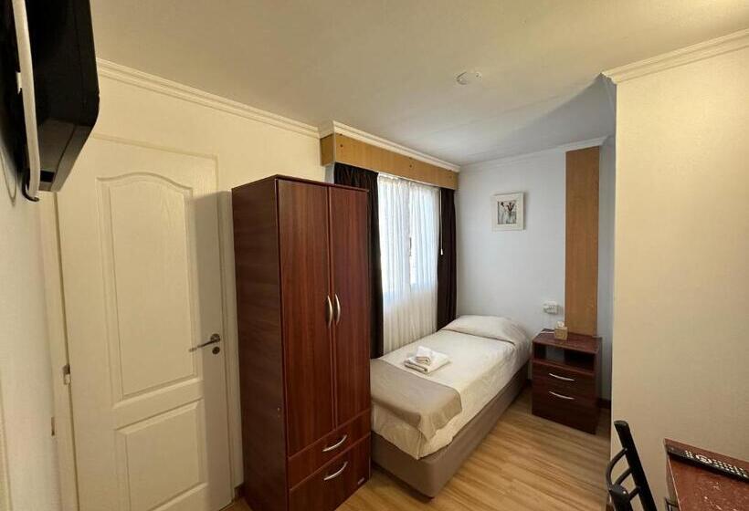 标准单人间, Kelman