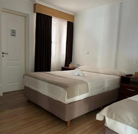 标准三人间, Kelman