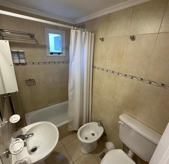 标准三人间, Kelman