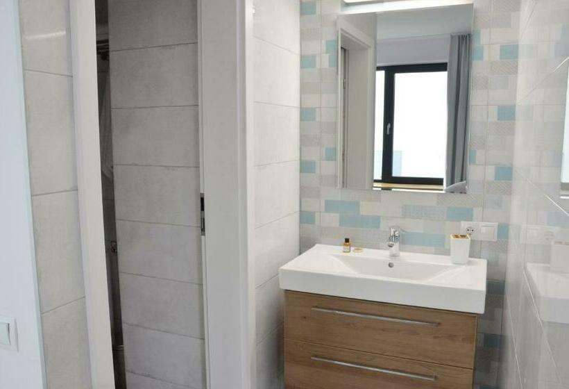 سوییت خانوادگی, Tip Tap Guest House