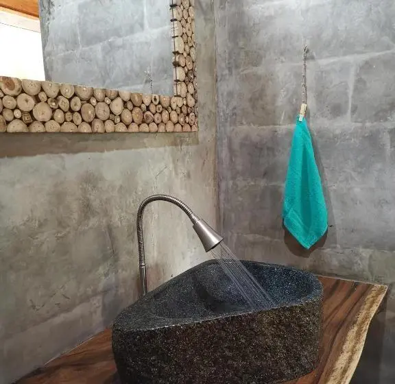 Quarto Deluxe, Coconut Tree Cottages