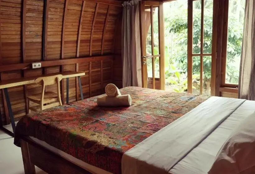 Quarto Deluxe, Coconut Tree Cottages
