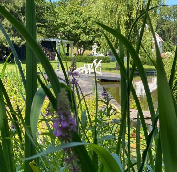 Quarto deluxe vista jardim, Gastenverblijf Nature 4 Persoons