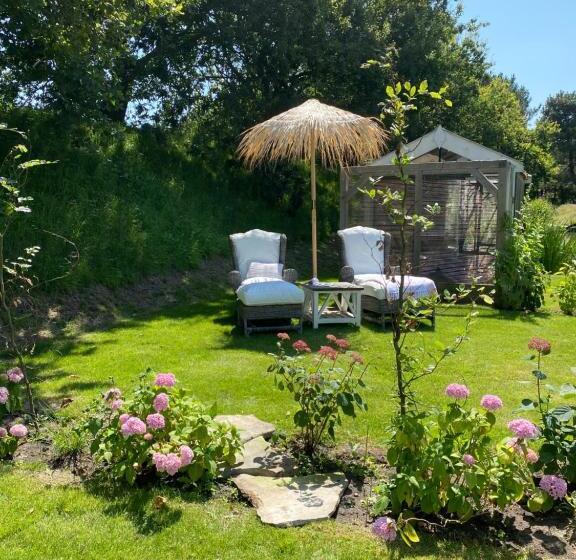 Quarto deluxe vista jardim, Gastenverblijf Nature 4 Persoons