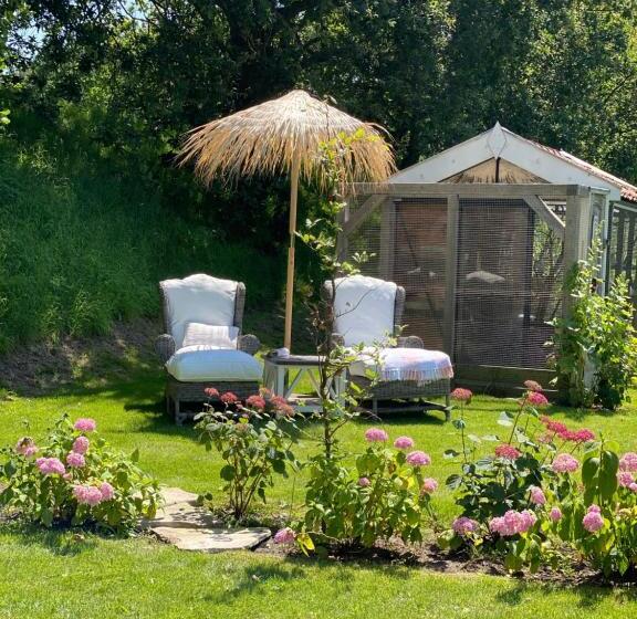 Quarto deluxe vista jardim, Gastenverblijf Nature 4 Persoons