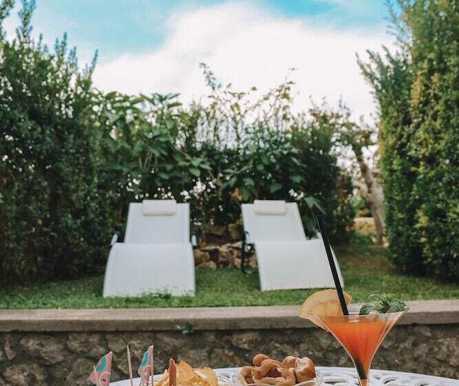 سوئیت جونیور با چشم‌انداز باغ, Al Mulino