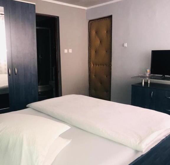 Quarto Estandar Cama King, Vila Nik Busteni