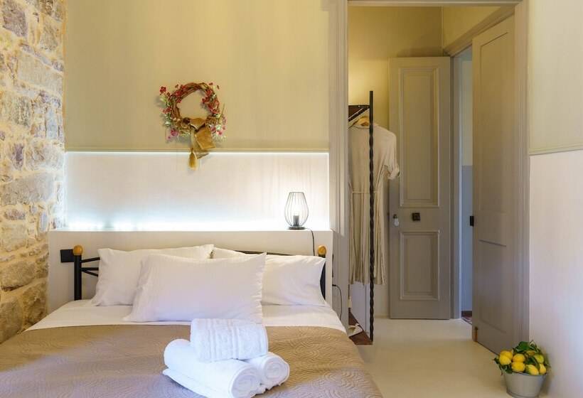 이코노미 룸, Voulamandis House