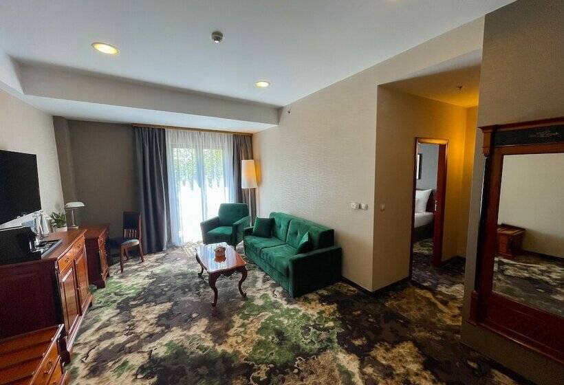 غرفة ديلوكس, Divinus