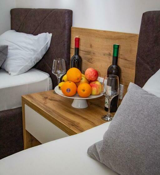 חדר דלוקס, Grand