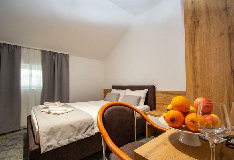 חדר דלוקס, Grand