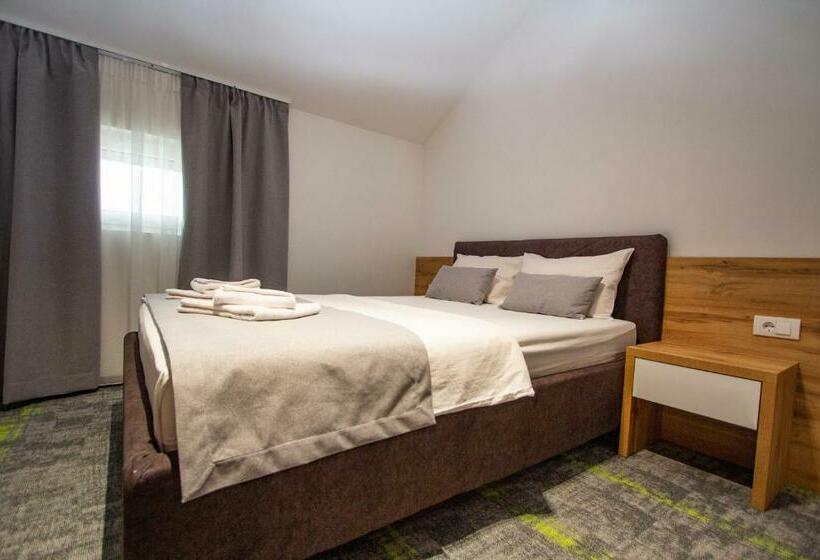 חדר דלוקס, Grand