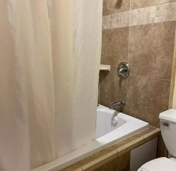 キングサイズベッドのスタンダードルーム, Riverside Inn & Suites Santa Cruz