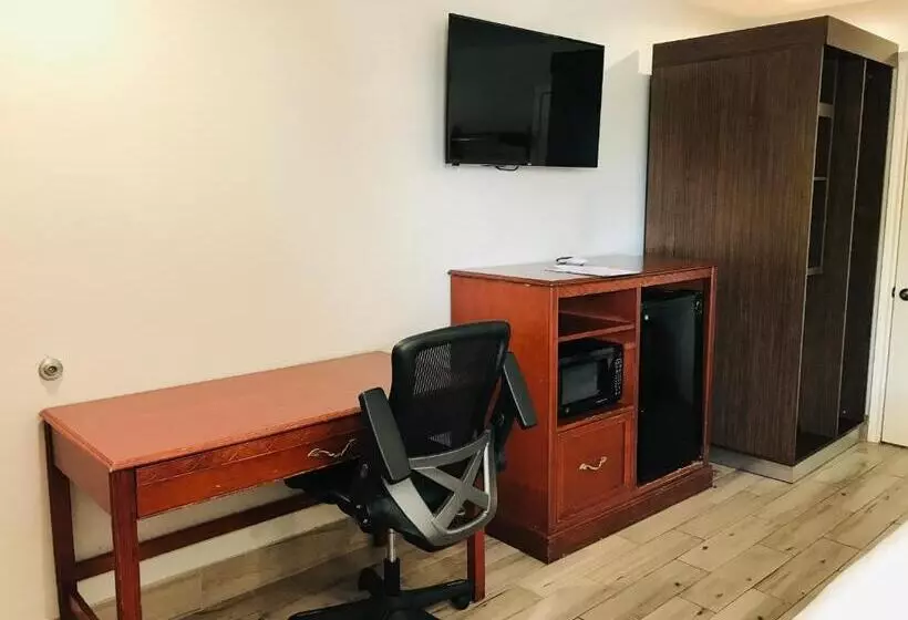 キングサイズベッドのスタンダードルーム, Summit Inn  Houston Medical Center  Nrg Park