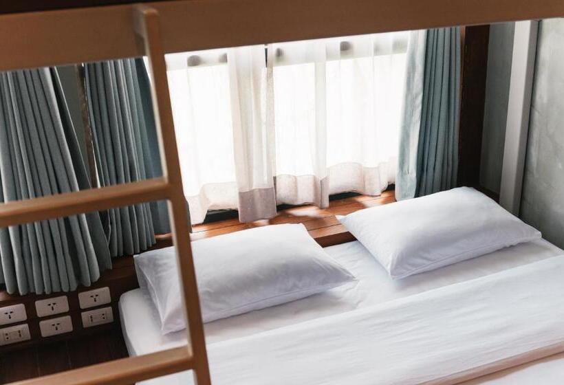 اتاق خانوادگی با سرویس بهداشتی مشترک, Tamni