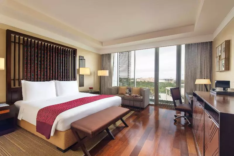 キングサイズベッドのエクゼクティブルーム, Kempinski Hotel Gold Coast City