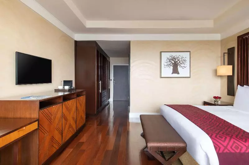 キングサイズベッドのエクゼクティブルーム, Kempinski Hotel Gold Coast City
