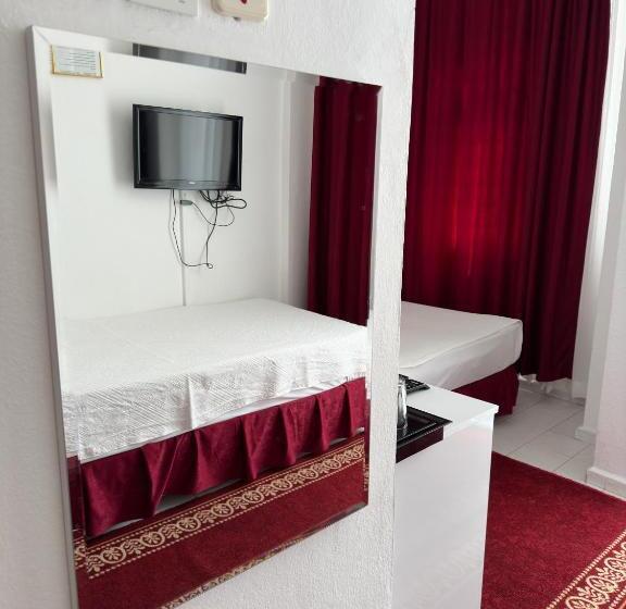 חדר סטנדרט לשלושה, Soykan