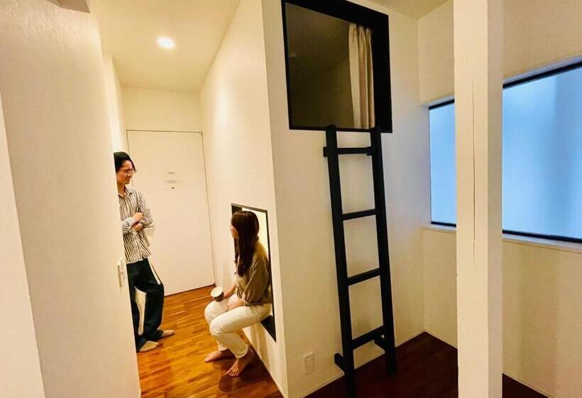 سرير فى غرفة مشتركه, En  Hostel & Café Bar