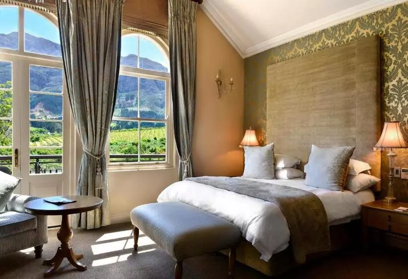 Suite with lake view, L Ermitage   Franschhoek Chateau & Villas