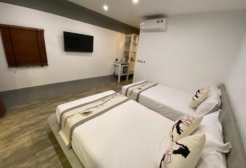 اتاق استاندارد سه تخته با چشمانداز باغ, Homestay Papa Garden