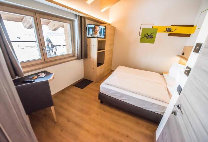 اتاق اکونومی, Le Alpi