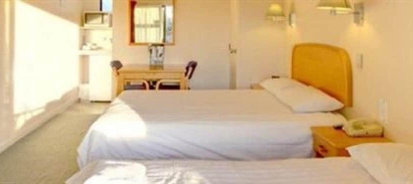 Escritório Estándar, Rayland Epsom Motel