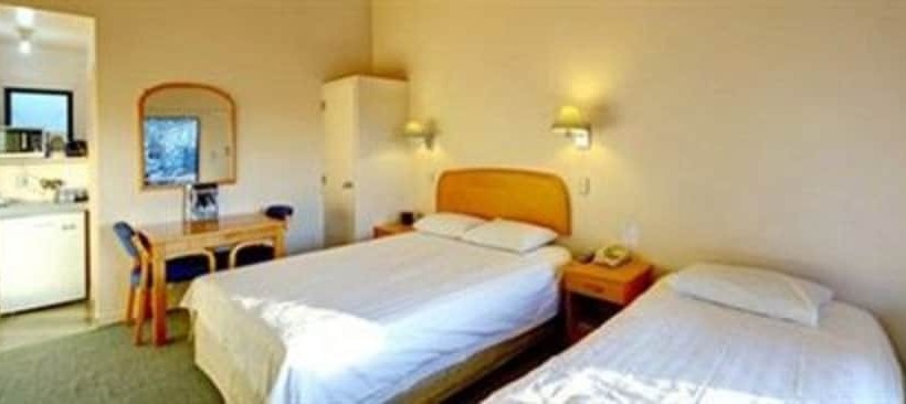 Escritório Estándar, Rayland Epsom Motel