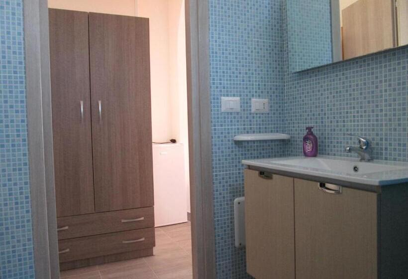 Quarto Triplo Estandar, Affittacamere Oriente