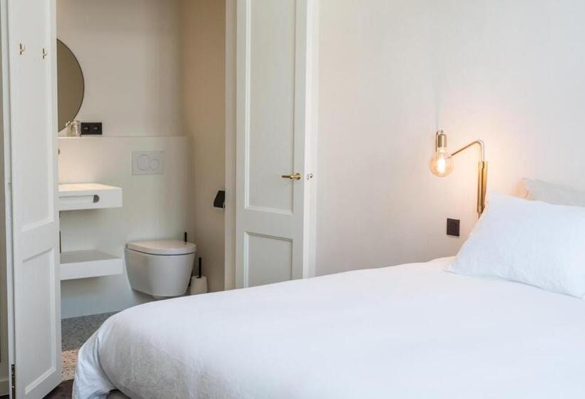 חדר דחוקס עם מיטת קינג, B Guest Sleep & Retreat