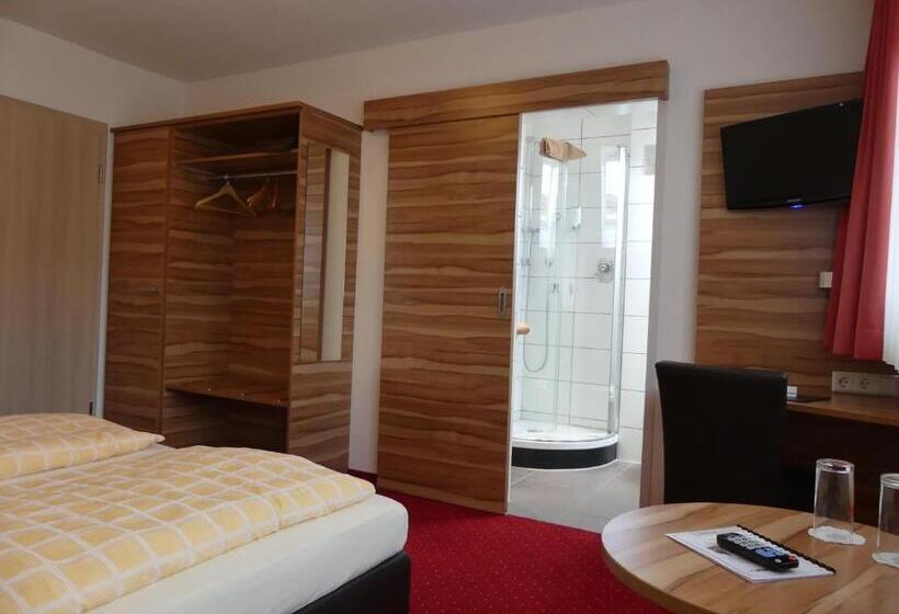 Quarto Comfort, Krone Garni