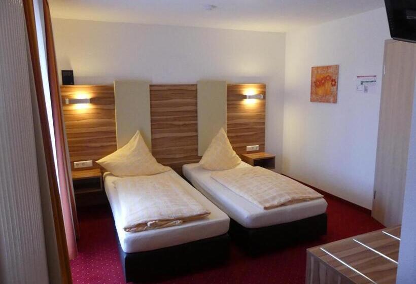 Quarto Comfort, Krone Garni