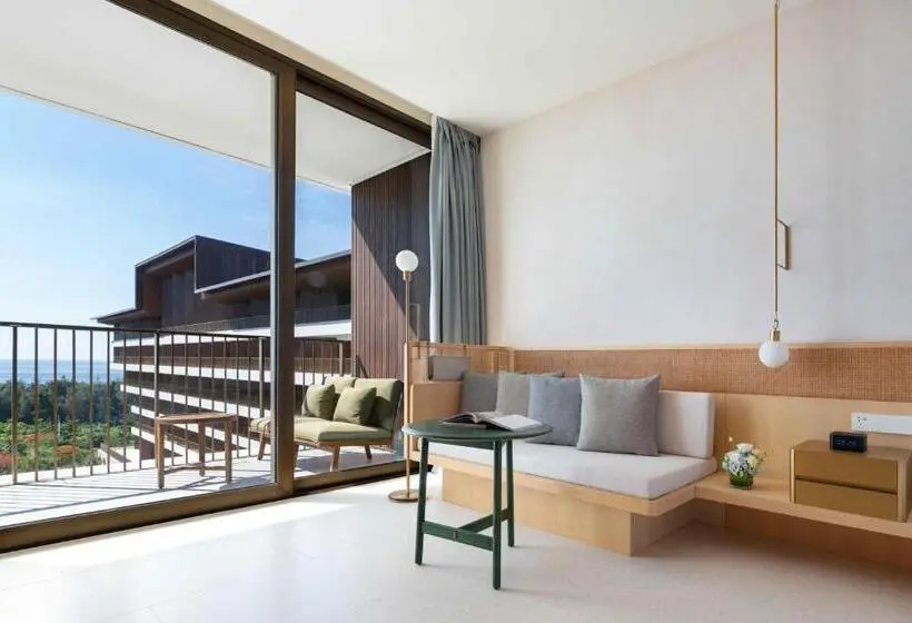 キングサイズベッドのデラックスルーム, The Taikang Sanya, A Tribute Portfolio Resort