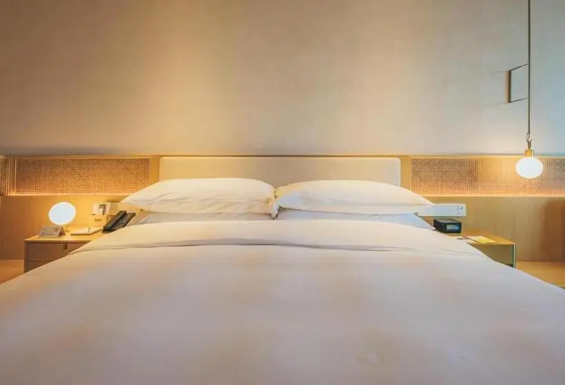 キングサイズベッドのデラックスルーム, The Taikang Sanya, A Tribute Portfolio Resort