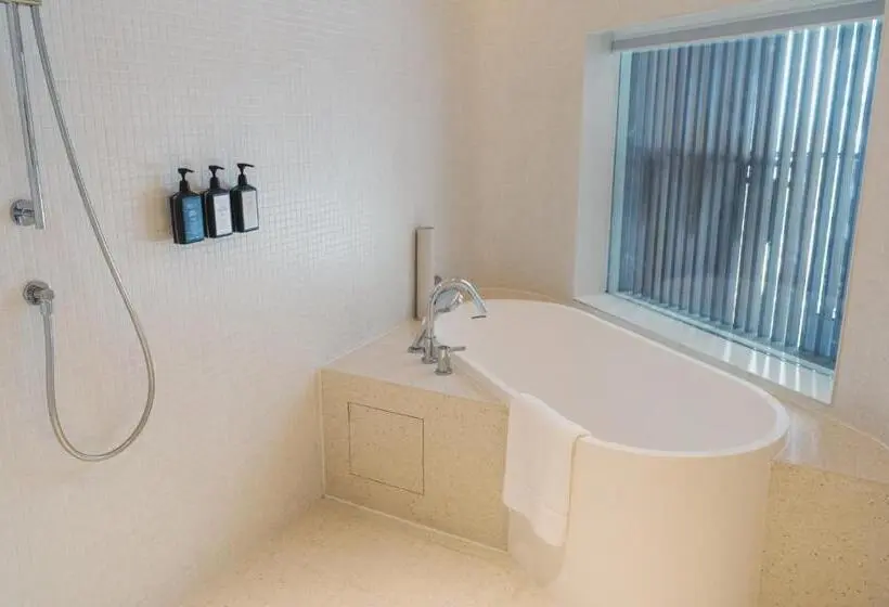 キングサイズベッドのデラックスルーム, The Taikang Sanya, A Tribute Portfolio Resort