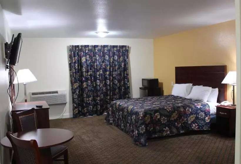 キングサイズベッドのスタンダードルーム, Passport Inn And Suites  Middletown