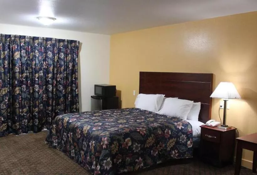 キングサイズベッドのスタンダードルーム, Passport Inn And Suites  Middletown