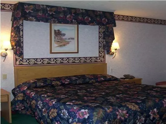 キングサイズベッドのスタンダードルーム, Passport Inn And Suites  Middletown