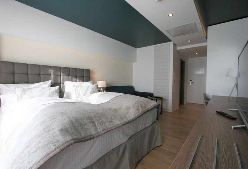 اتاق لوکس با چشم‌انداز دریا, Parkhotel Residenz